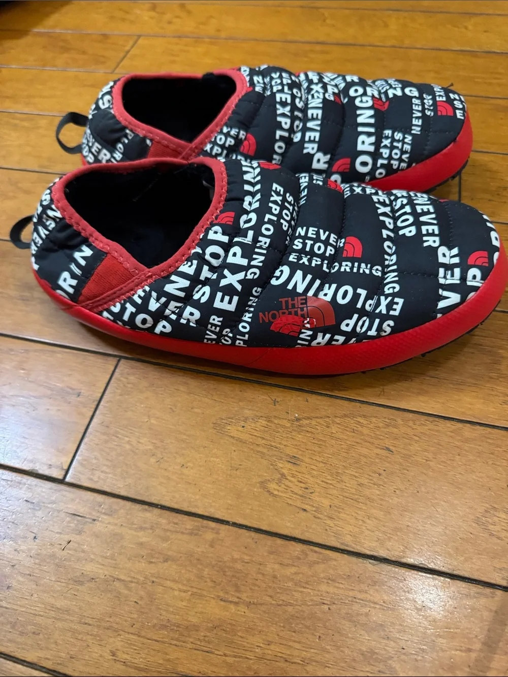The North Face Men’s Quilted Slip-On Slippers in Black and Red